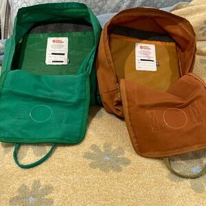 Fjallraven Kanken Backpacks green and orange